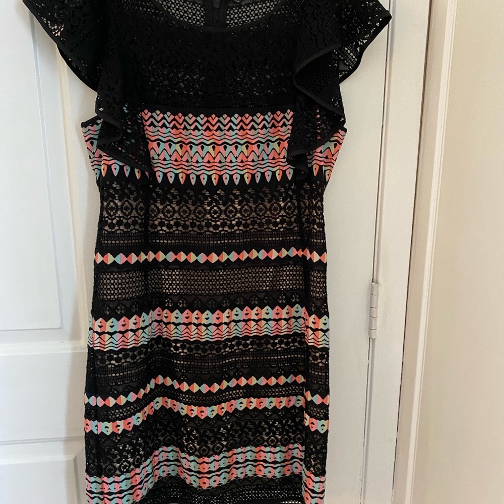 This is a multi-colored dress perfect for afternoon special occasions